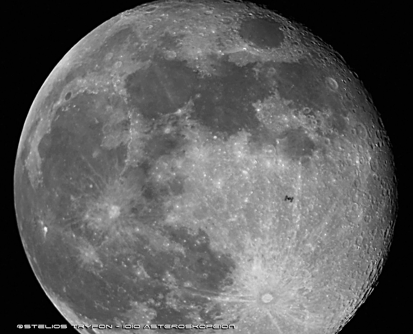 ISS CROSSING THE DISC OF THE MOON IN A VISIBLE PASS DUE TO
