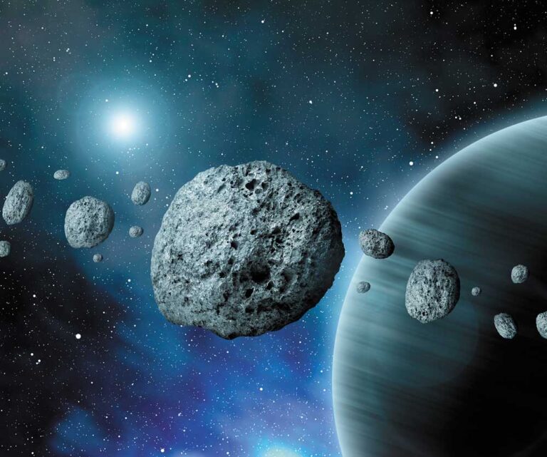 several orbs in a line at increasing closeness and a bright light in the upper left on a dark blue background