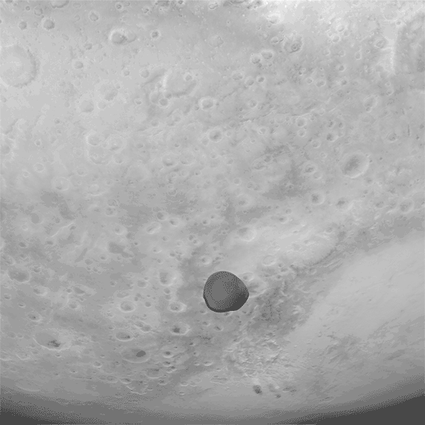 Deimos is dark uneven rock with bright Mars landscape in the background