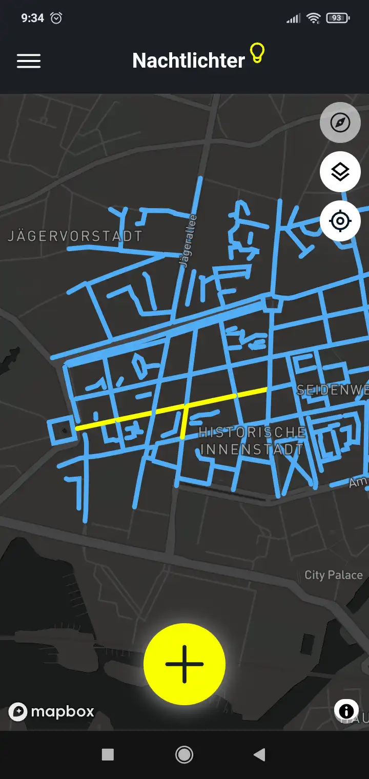 App screenshot shows streets highlighted in blue