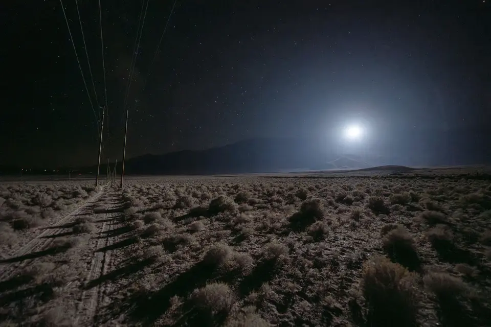 Reflect Orbital image of spotlight shining across the California desert