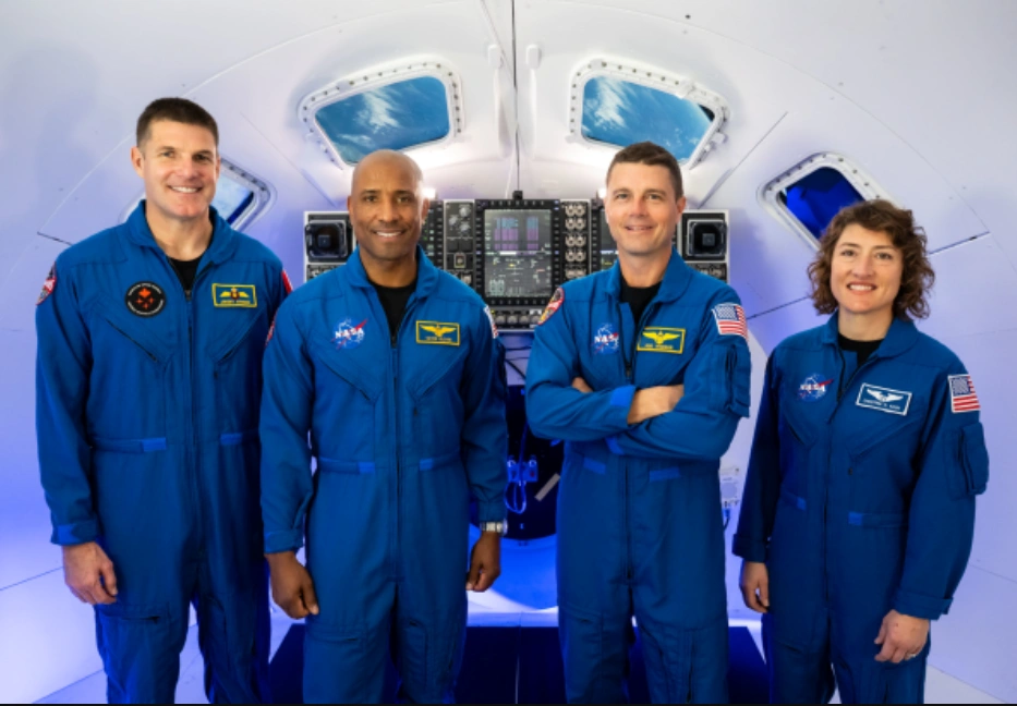 Photo of Artemis 2 crew in blue suits