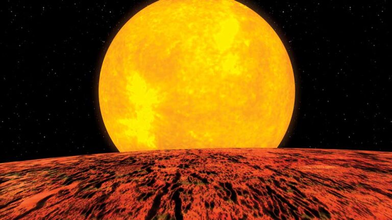 a yellow orb with a red and black ground in the foreground on a black background