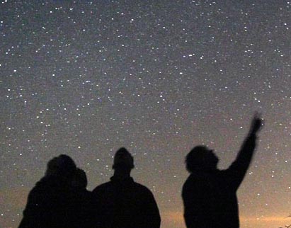 person looking at night sky