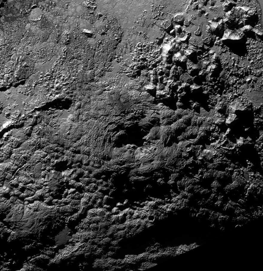PLUTONIUM IMAGINATION　139 Plutonian Mounts Aren't Ice Volcanoes - Sky & Telescope