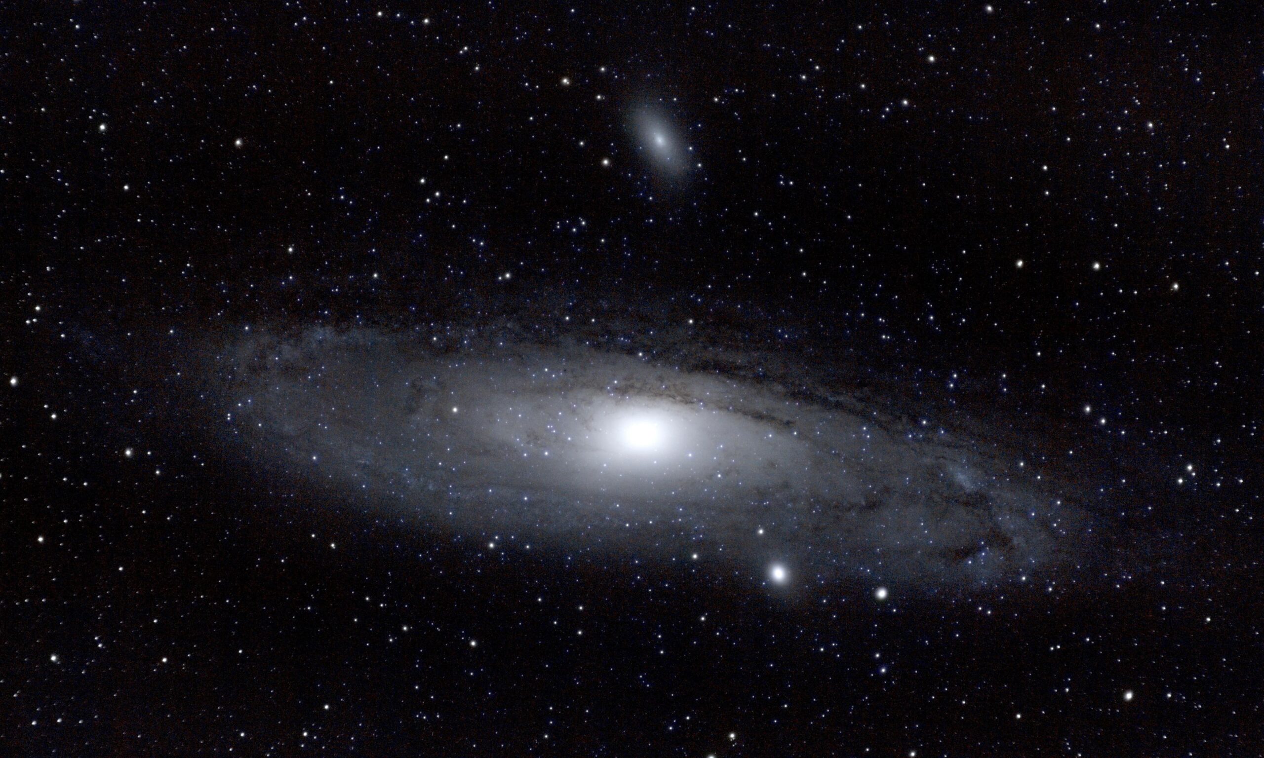 Andromeda and its largest satellite galaxies