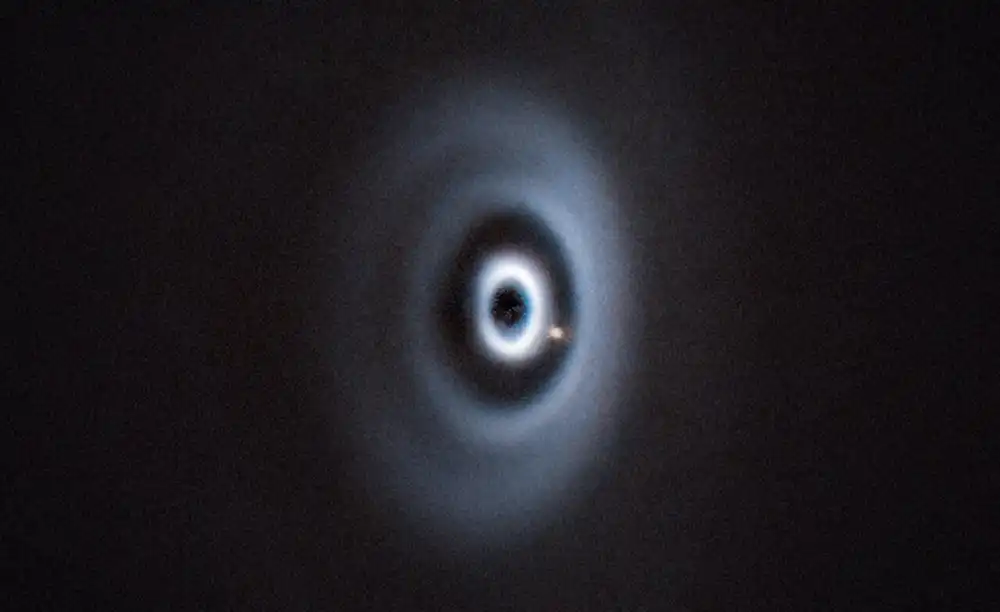 Image of a forming planet that has cleared a gap in a disk around a young star